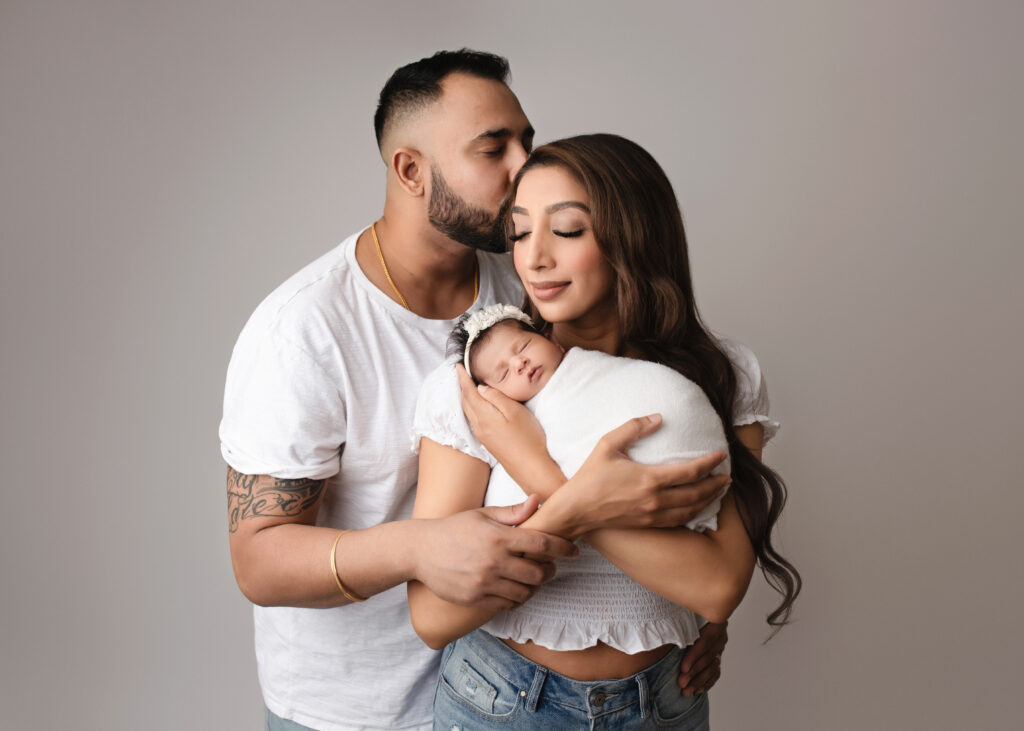Newborn photography with parents family poses